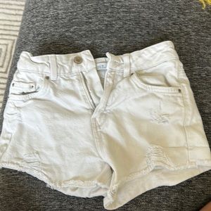 Zara size 10 distressed white jean shorts